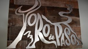 The unique Toro de Paso metal sign in the Bodega de Edgar tasting room in Paso Robles